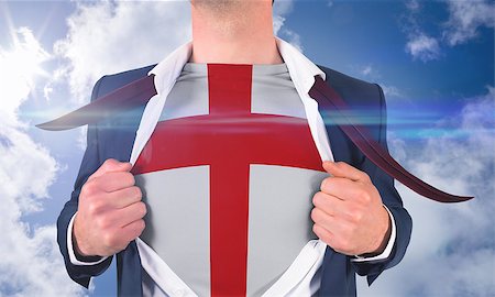 simsearch:400-07664375,k - Businessman opening shirt to reveal england flag against bright blue sky with clouds Foto de stock - Royalty-Free Super Valor e Assinatura, Número: 400-07528385
