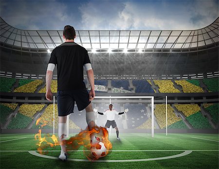 simsearch:400-07665266,k - Composite image of football player about to take a penalty against football pitch in large stadium Stock Photo - Budget Royalty-Free & Subscription, Code: 400-07528428