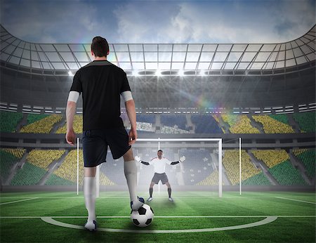 simsearch:400-07665266,k - Composite image of football player about to take a penalty against football pitch in large stadium Stock Photo - Budget Royalty-Free & Subscription, Code: 400-07528437