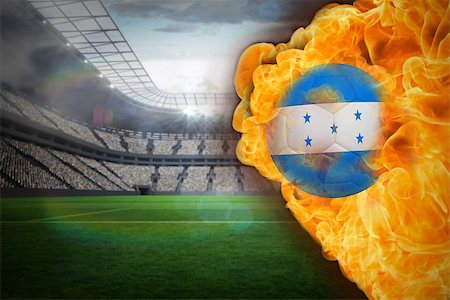 Composite image of fire surrounding honduras flag football against large football stadium with lights Stock Photo - Budget Royalty-Free & Subscription, Code: 400-07528489