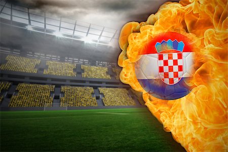 Composite image of fire surrounding croatia flag football against large football stadium with lights Stock Photo - Budget Royalty-Free & Subscription, Code: 400-07528511