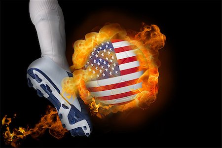 simsearch:400-07527960,k - Football player kicking flaming usa ball against black Stock Photo - Budget Royalty-Free & Subscription, Code: 400-07528534