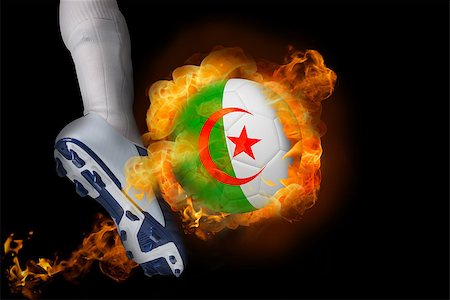 simsearch:400-07527960,k - Football player kicking flaming algeria ball against black Stock Photo - Budget Royalty-Free & Subscription, Code: 400-07528535