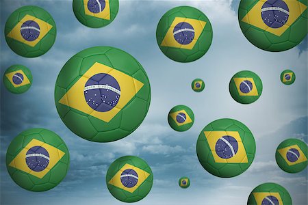 simsearch:400-07527966,k - Footballs in brasil flag colours  against desert landscape Foto de stock - Royalty-Free Super Valor e Assinatura, Número: 400-07528626