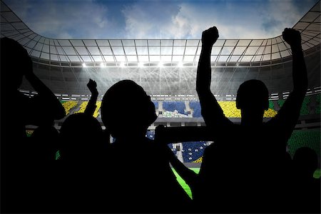 soccer fans in stadium - Silhouettes of football supporters against large football stadium with brasilian fans Stock Photo - Budget Royalty-Free & Subscription, Code: 400-07528845