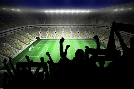 soccer fans in stadium - Silhouettes of football supporters against large football stadium with lights Stock Photo - Budget Royalty-Free & Subscription, Code: 400-07528840