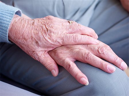 hand of an elderly woman holding the hand of an elderly man. Stock Photo - Budget Royalty-Free & Subscription, Code: 400-07545127