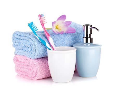 simsearch:400-04789848,k - Toothbrushes, soap and two towels. Isolated on white background Stock Photo - Budget Royalty-Free & Subscription, Code: 400-07545207