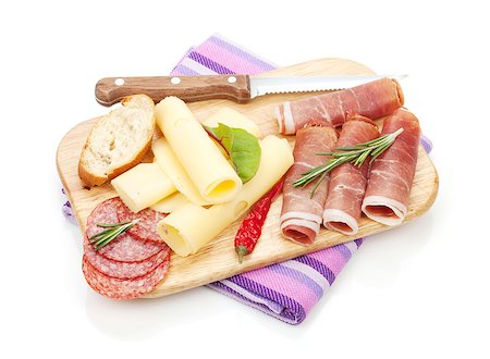 simsearch:400-07481818,k - Cheese, prosciutto, bread, vegetables and spices. Isolated on white background Foto de stock - Super Valor sin royalties y Suscripción, Código: 400-07545238