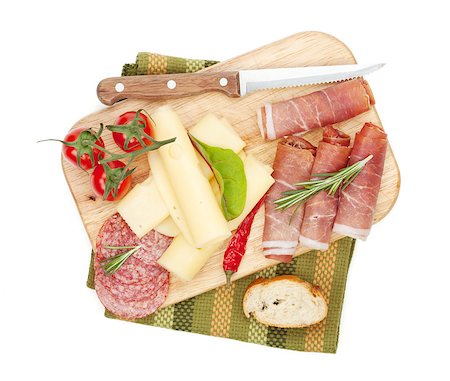 simsearch:400-07481817,k - Cheese, prosciutto, bread, vegetables and spices. Isolated on white background Stock Photo - Budget Royalty-Free & Subscription, Code: 400-07545239