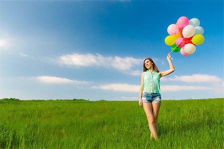 simsearch:400-08262183,k - Young beautiful woman with colorful balloons on a green meadow Stock Photo - Budget Royalty-Free & Subscription, Code: 400-07545661