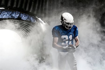 simsearch:6109-08389992,k - Football player, leaving a smoky tunnel, ready to get on the field Stock Photo - Budget Royalty-Free & Subscription, Code: 400-07545857
