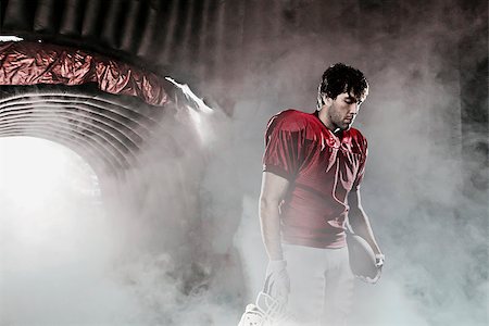 Football player with a red uniform, in a stadium with fans wearing red uniform Photographie de stock - Aubaine LD & Abonnement, Code: 400-07545851