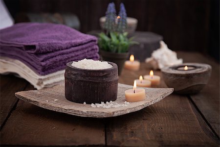 Spa and wellness setting with natural bath salt, candles, towels and flower. Wooden dayspa nature set Stockbilder - Microstock & Abonnement, Bildnummer: 400-07546066