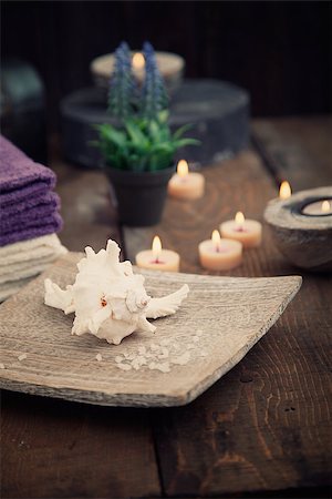 spa background - Spa and wellness setting with natural bath salt, candles, towels and flower. Wooden dayspa nature set Stock Photo - Budget Royalty-Free & Subscription, Code: 400-07546067