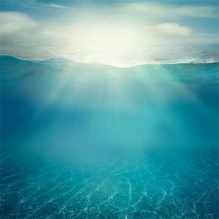 Summer background. Underwater sea view. Ocean water surface. Photographie de stock - Aubaine LD & Abonnement, Code: 400-07546060