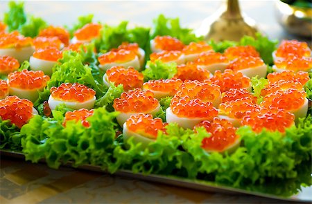 simsearch:400-07572419,k - Stuffed eggs with red caviar Stock Photo - Budget Royalty-Free & Subscription, Code: 400-07546204