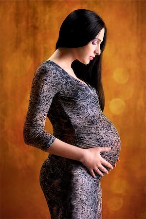 simsearch:400-07557771,k - Beautiful pregnant young brunette Photographie de stock - Aubaine LD & Abonnement, Code: 400-07546210