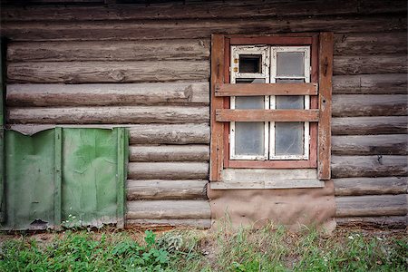 Weathered log house wall with boarded up window Stock Photo - Budget Royalty-Free & Subscription, Code: 400-07546254