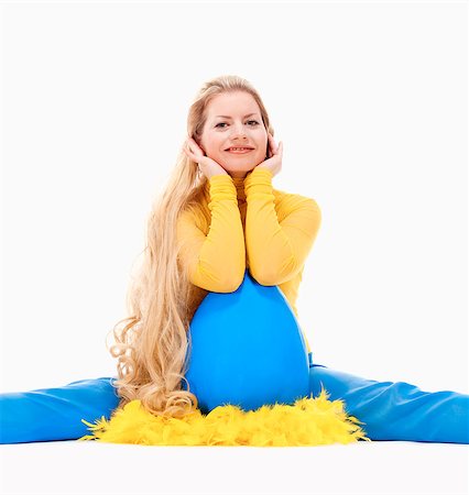 Easter - Young Woman with Long Blond Hair and Large Blue Egg. Photographie de stock - Aubaine LD & Abonnement, Code: 400-07548629