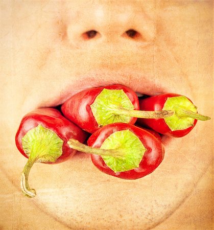 simsearch:400-07899696,k - people with chile peppers in the mouth, artwork in painting style Photographie de stock - Aubaine LD & Abonnement, Code: 400-07548731