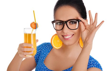 pop art of holding - Young woman with orange slice earrings and glasses holds a glass of  orange juice, on white background Stock Photo - Budget Royalty-Free & Subscription, Code: 400-07549500