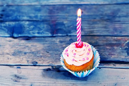 Birthday greeting card with cupcake and candle Stock Photo - Budget Royalty-Free & Subscription, Code: 400-07549502