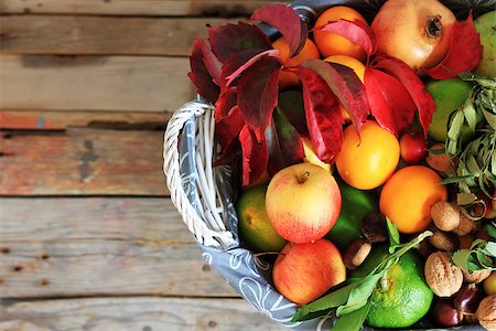 Photo of white basket with autumn fruits Stock Photo - Budget Royalty-Free & Subscription, Code: 400-07549515