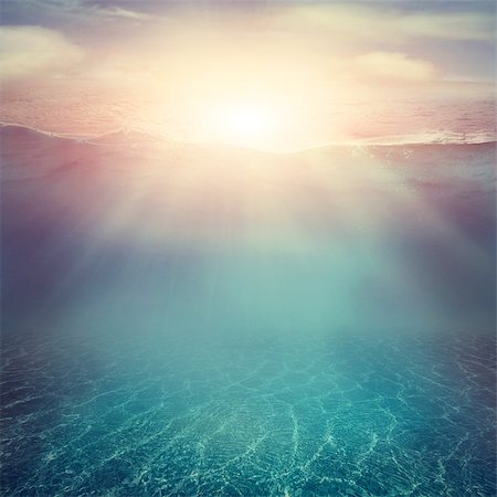 Summer background. Underwater sea view. Ocean water surface. Photographie de stock - Aubaine LD & Abonnement, Code: 400-07549594
