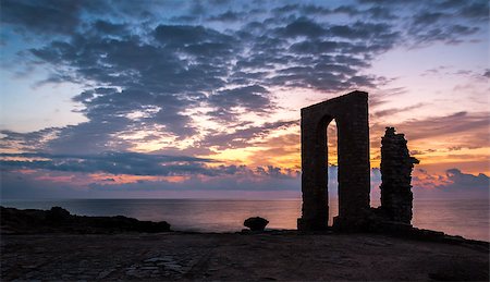 Sunset over the Sea and Rocky Coast with Ancient Ruins and Gate to Africa in Mahdia, Tunisia Stock Photo - Budget Royalty-Free & Subscription, Code: 400-07556901