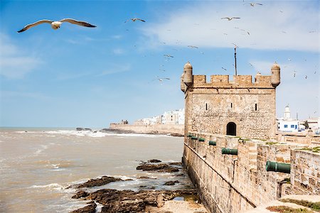 essaouira - Essaouira: the Portuguese castle. Essaouira is a city in the western Morocco, on the Atlantic coast, Africa. Foto de stock - Super Valor sin royalties y Suscripción, Código: 400-07557536