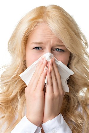 simsearch:400-06555470,k - Portrait of a ill blond woman who is sneezing in a tissue Stockbilder - Microstock & Abonnement, Bildnummer: 400-07557642