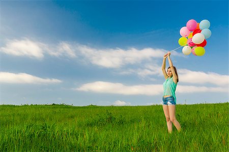 simsearch:400-08262183,k - Young beautiful woman with colorful balloons on a green meadow Stock Photo - Budget Royalty-Free & Subscription, Code: 400-07558142