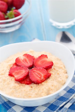 porridge and berries - Healthy homemade oatmeal with strawberries for breakfast Stock Photo - Budget Royalty-Free & Subscription, Code: 400-07558527