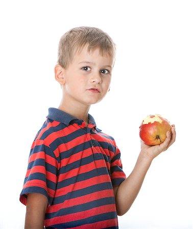 simsearch:400-05014700,k - Boy holding an apple  isolated on white background Fotografie stock - Microstock e Abbonamento, Codice: 400-07550508
