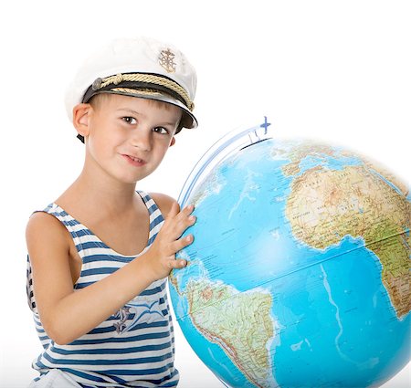 physical education - Boy holding a globe  isolated on white background Photographie de stock - Aubaine LD & Abonnement, Code: 400-07550500