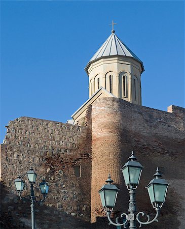 simsearch:400-08157990,k - Old fortress is situated against the blue sky background. This is the Naricala fortress (Tbilisi, Georgia). Foto de stock - Super Valor sin royalties y Suscripción, Código: 400-07550778