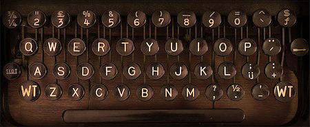 puntuación - Close up of a dirty vintage typewriter, warm filter Foto de stock - Super Valor sin royalties y Suscripción, Código: 400-07551532