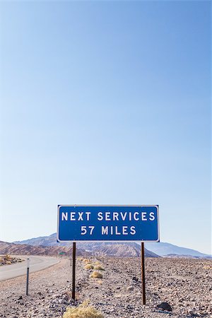 simsearch:400-07252682,k - Death Valley, USA. Next service streetsight useful for travel concept Fotografie stock - Microstock e Abbonamento, Codice: 400-07551673