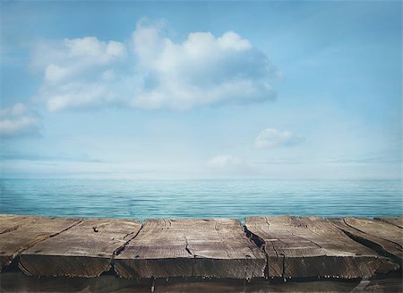 Wood table and tropical landscape in the background.. Spring or summer abstract nature background. Stockbilder - Microstock & Abonnement, Bildnummer: 400-07552851