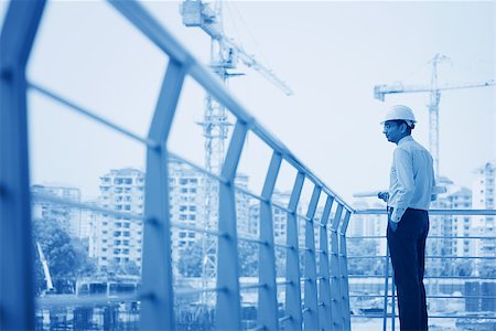 engineer background - Asian Indian architect visiting construction plant, inspecting the progress. Stock Photo - Budget Royalty-Free & Subscription, Code: 400-07553691