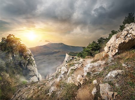 simsearch:400-07570603,k - High rocks and gray clouds at sunset Stock Photo - Budget Royalty-Free & Subscription, Code: 400-07553833