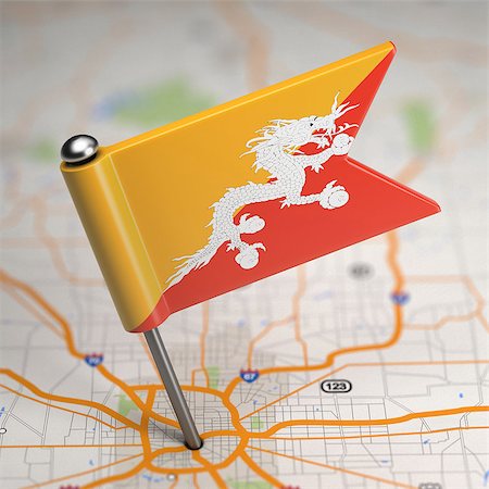 simsearch:400-07297651,k - Small Flag of Kingdom of Bhutan on a Map Background with Selective Focus. Stock Photo - Budget Royalty-Free & Subscription, Code: 400-07568170