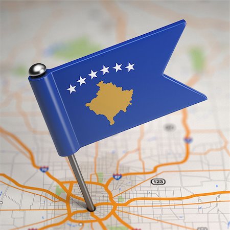 simsearch:400-07297651,k - Small Flag of Republic of Kosovo on a Map Background with Selective Focus. Stock Photo - Budget Royalty-Free & Subscription, Code: 400-07568173