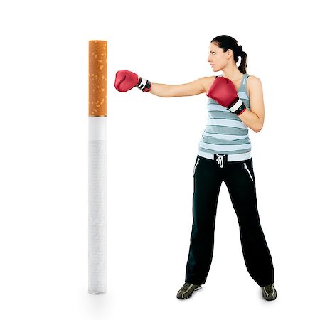 No smoking. Young girl boxing cigarette Stock Photo - Budget Royalty-Free & Subscription, Code: 400-07568409