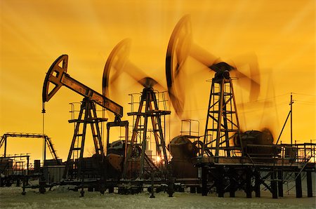 Pump jacks  at sunset sky background. Stock Photo - Budget Royalty-Free & Subscription, Code: 400-07574589