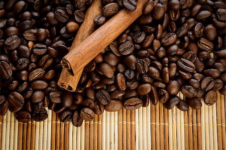 simsearch:400-06700189,k - handful aromatic coffee beans with cinnamon Stock Photo - Budget Royalty-Free & Subscription, Code: 400-07574598