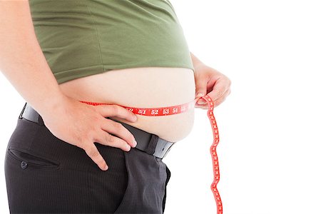 simsearch:400-06178010,k - fat man use scale to measure his waistline Stock Photo - Budget Royalty-Free & Subscription, Code: 400-07575405
