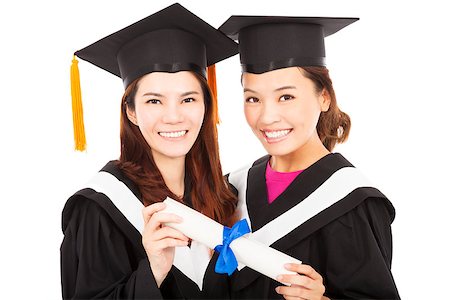 simsearch:400-07305822,k - two smiling young graduate students holding a diploma Stock Photo - Budget Royalty-Free & Subscription, Code: 400-07575425