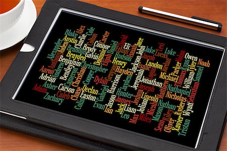 most popular boy baby names in 2012 in USA  - word cloud on a  digital tablet with a cup of tea Foto de stock - Super Valor sin royalties y Suscripción, Código: 400-07575675